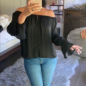 L’academie off shoulder silk blouse.